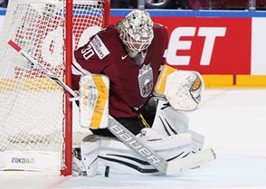COLOGNE, GERMANY - MAY 13: Latvia's Elvis Merzlikins #30 makes the save during preliminary round action against the U.S. at the 2017 IIHF Ice Hockey World Championship. (Photo by Andre Ringuette/HHOF-IIHF Images)

