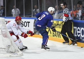 PARIS, FRANCE - MAY 12: Belarus's Andrei Stas #23 stick checks France's Jonathan Janil #3 during preliminary round action at the 2017 IIHF Ice Hockey World Championship. (Photo by Matt Zambonin/HHOF-IIHF Images)
