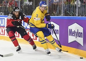 COLOGNE, GERMANY - MAY 21: Canada's Ryan O'Reilly #90 stickchecks the puck away from Sweden's John Klingberg #3 during gold medal game action at the 2017 IIHF Ice Hockey World Championship. (Photo by Matt Zambonin/HHOF-IIHF Images)

